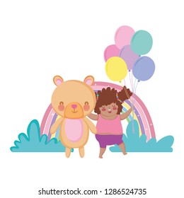 Little chubby girl with rainbow and balloons helium