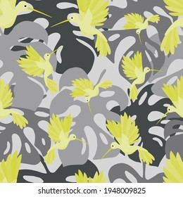 Little colibri small bird and tropic monstera leaves seamless pattern. Vector illustration.