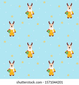 Little deer baby in yellow clothes with christmas tree on blue background. Seamless pattern