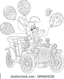 Little Easter Bunny friendly smiling, waving in greeting and driving a toy retro car decorated with holiday balloons, black and white outline vector cartoon illustration