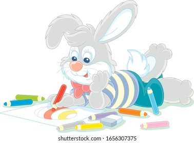 Little Easter bunny smiling and drawing a decorated holiday egg with color pencils on a sheet of paper for a greeting card, vector cartoon illustration on a white background