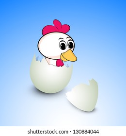 Little Easter duckling coming out from egg.