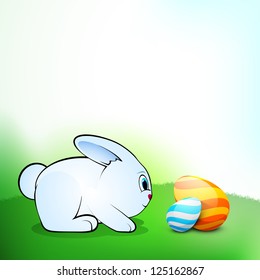 Little Easter Rabbit with beautiful painted Easter Eggs on nature background. EPS 10.