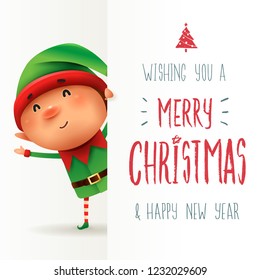 Little Elf with big signboard. Merry Christmas calligraphy lettering design. Creative typography for holiday greeting.