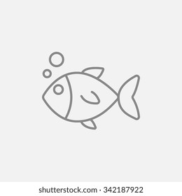 Little fish under water line icon for web, mobile and infographics. Vector dark grey icon isolated on light grey background.