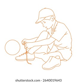 A little footballer boy tying his shoelaces at home