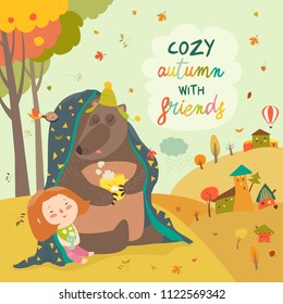 Little girl and bear sitting under plaid on the autumn lawn