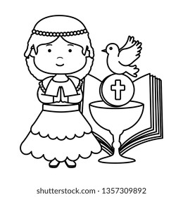 little girl with bible and chalice first communion