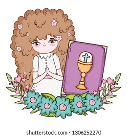 little girl with bible in first communion celebration
