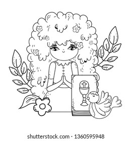 little girl with bible in first communion celebration