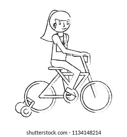 little girl in bicycle with auxiliary rims