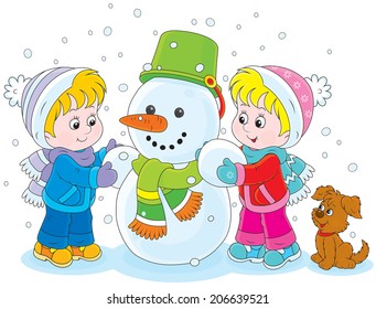 Little girl and boy make a funny snowman