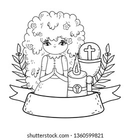 little girl with candle in first communion celebration