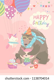 Little girl celebrating Birthday with bear