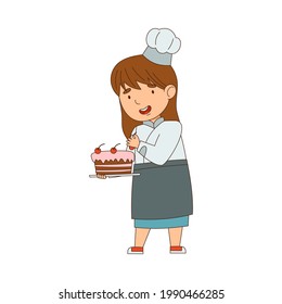 Little Girl Chef in White Toque and Jacket Decorating Cake with Cherry Vector Illustration