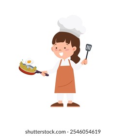 Little girl is cooking using a frying pan and holding a spatula