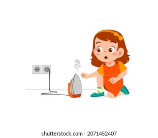 little girl curious to touch hot electric iron