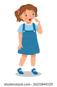 Little girl drinking a glass of milk