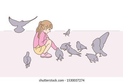 A little girl is feeding pigeons in the park. hand drawn style vector design illustrations. 