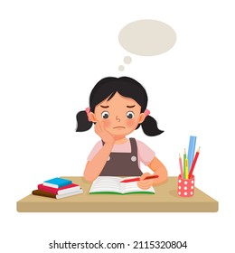 Little girl with hand on her cheek feeling tired, bored and lazy studying doing her difficult homework at the desk at home