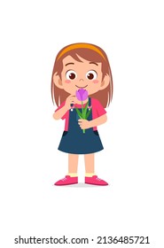 little girl holding flower and sniff the scent