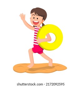 a little girl holding an inflatable circle and running on the sand in summer