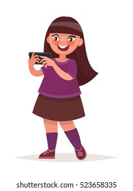 Little girl holding a smartphone. Vector illustration in cartoon style