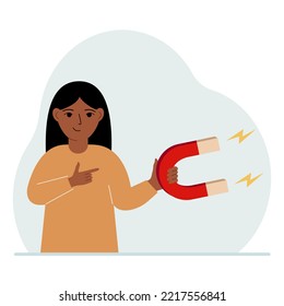 A little girl holds a huge magnet in his hand. Vector flat illustration