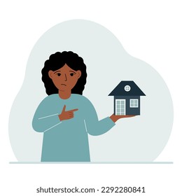 A little girl holds a small house in his palm. Concepts of inheritance or transfer of real estate to children. Vector flat illustration