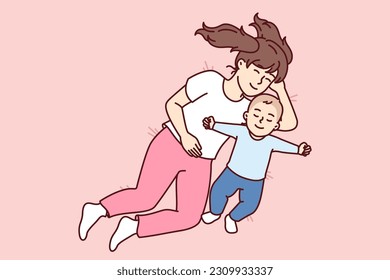 Little girl hugging newborn brother lying in bed and falling asleep together for happy childhood concept. Caring preteen sister near carelessly sleeping little toddler resting after day walk