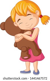 Little girl hugging teddy bear