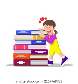 little girl hugs a pile of books because she loves it so much