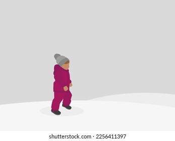 A little girl in a jacket and a hat walking in the snow in winter
