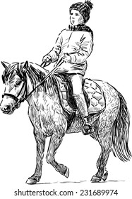 little girl on a pony