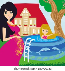 little girl in outdoor pool and her young pregnant mom