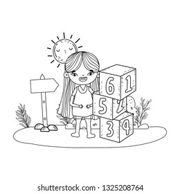 little girl playing with blocks numbers in the camp
