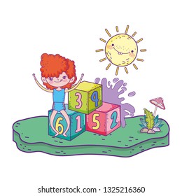 little girl playing with blocks numbers in the camp