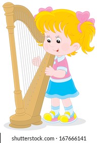 Little girl playing a harp