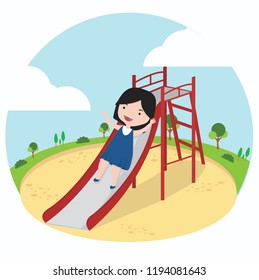 little girl playing slider enjoying in playground