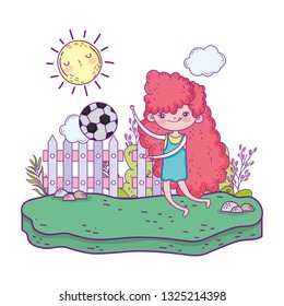little girl playing soccer in the landscape