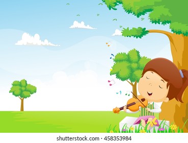 Little girl playing a violin in the park