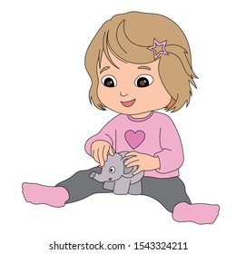 little girl plays with her elephant doll