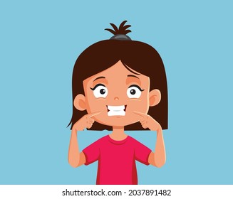 Little Girl Pointing to Her Toothy Smile Vector Cartoon. Funny toddler learning body parts showing her mouth while smiling largely 
