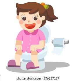 A Little girl is sitting on the toilet.