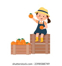 Little girl sitting on wooden nearby boxes with the harvest of the oranges