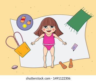 Little girl sunbathing on a beach. Girl relaxing in swimsuit looking at the sky.