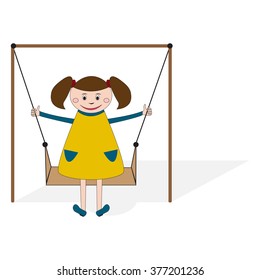 Little girl are swinging on swing in children play area or in kindergarten
