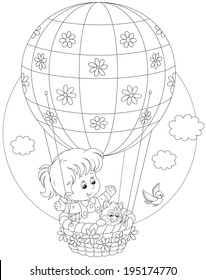 Little girl travelling with her kitten on an air balloon with flowers