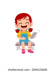 little girl using mobile phone and laugh