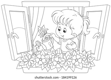 Little girl watering flowers on a windowsill